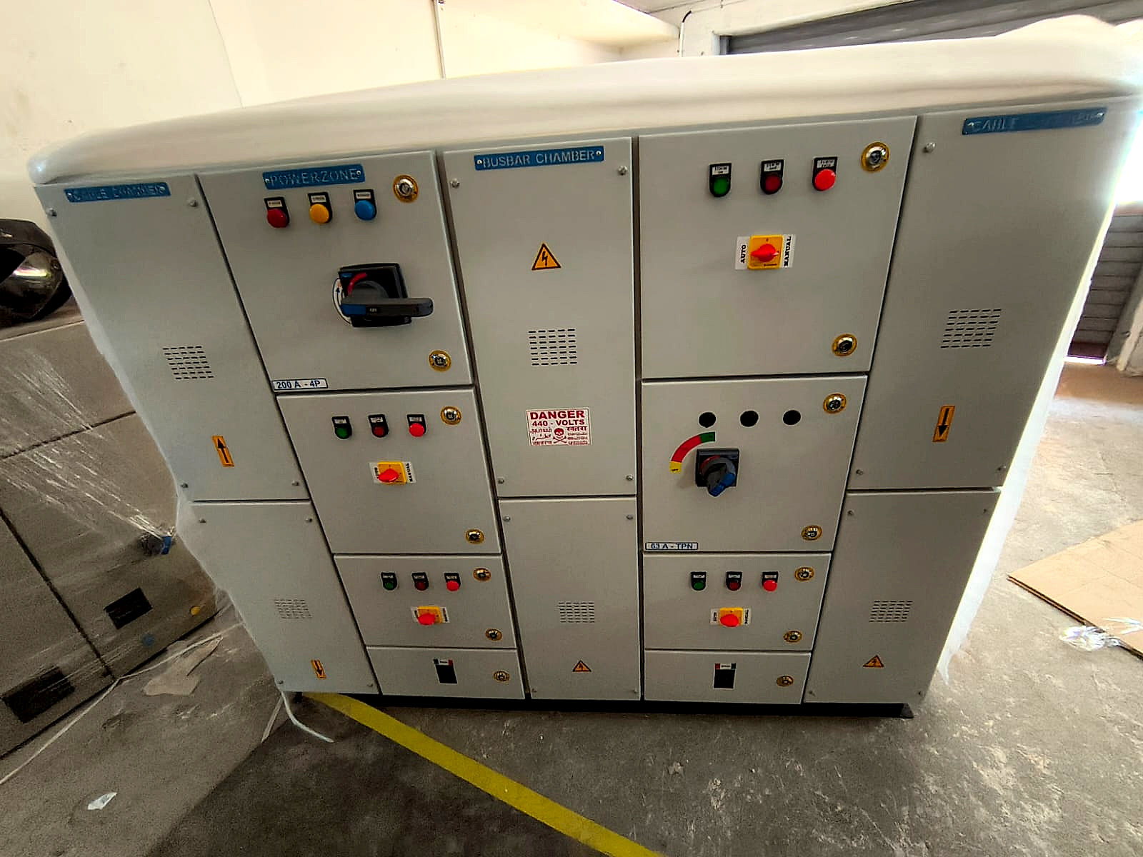 A power distribution panel built by PowerZone, standing on the works floor before dispatch